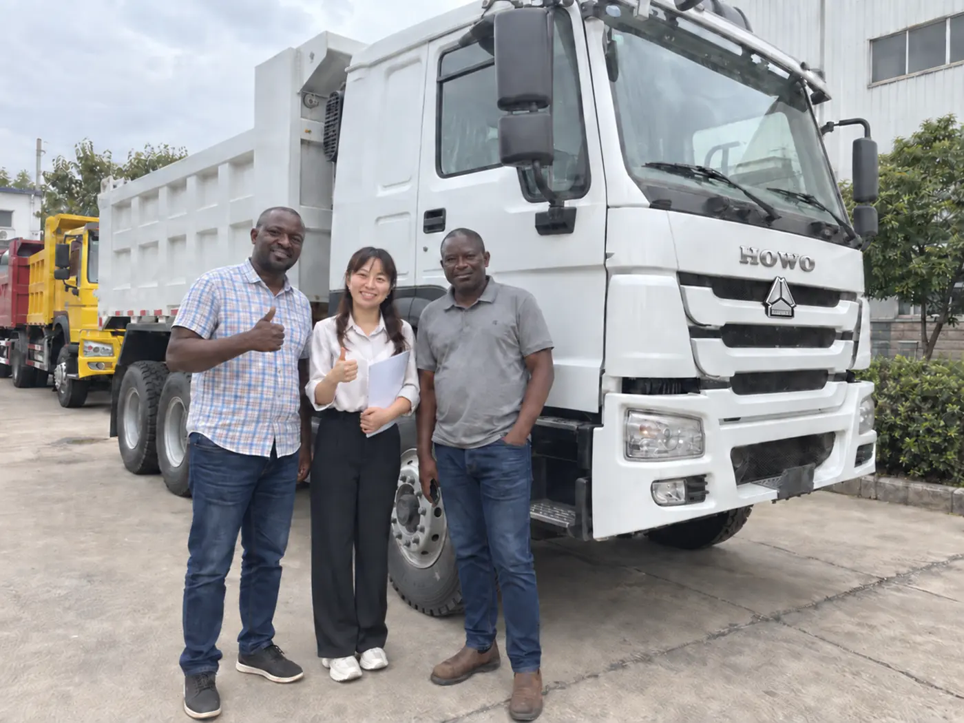 International customers receiving a new HOWO vehicle